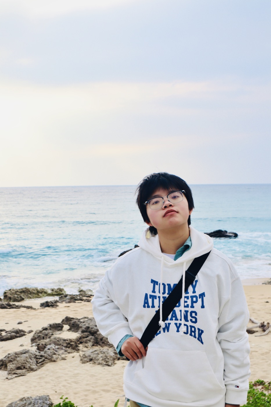 Galaxy Hong, founder of CHILLIX, on a beach beside the sea